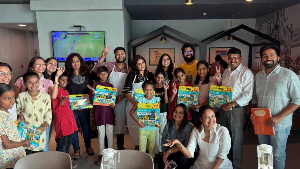 K Raheja Corp Employees with students of 'Back to School' Campaign